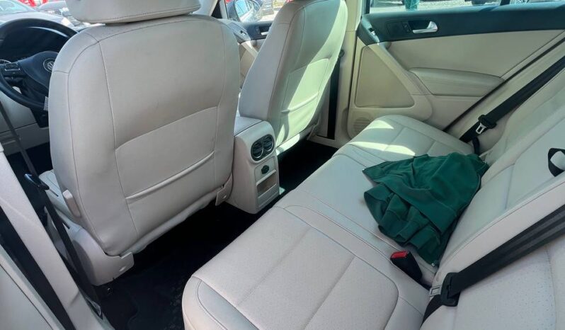 
								2011  VOLKSWAGEN Tiguan заповнено									