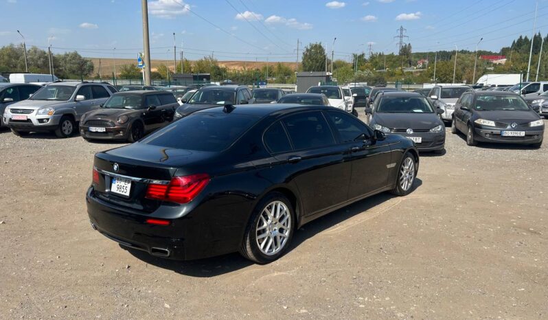 
								2011  BMW 7 S заповнено									