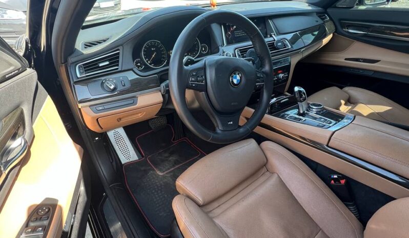 
								2011  BMW 7 S заповнено									