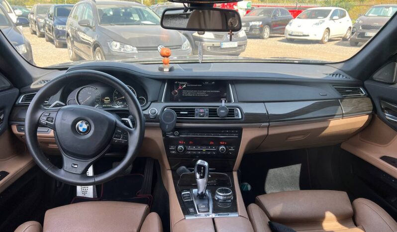
								2011  BMW 7 S заповнено									