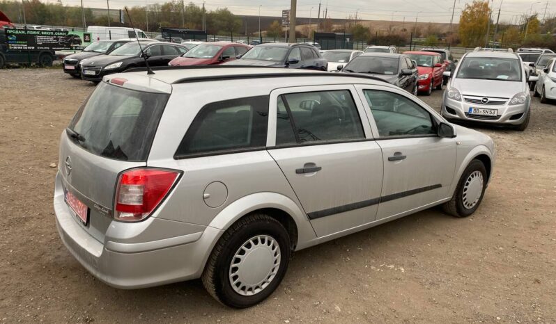 
								2009  OPEL Astra заповнено									