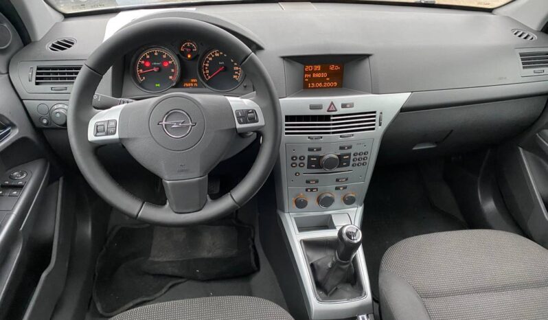 
								2009  OPEL Astra заповнено									